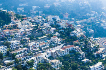 Fototapeta premium View of Positano town at Amalfi coastline. Colorful houses along the sea coast, Italy