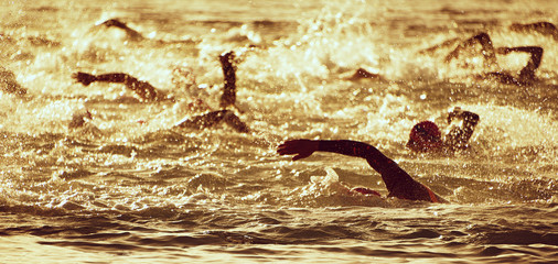 The swimmer's silhouette during the early racing in swimming
