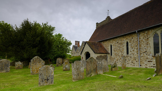 Spring afternoon light on an overcast day - View of St Mary's Church in Selborne, Hampshire, UK
