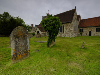 Spring afternoon light on an overcast day - View of St Mary's Church in Selborne, Hampshire, UK