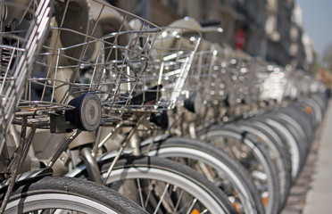Fototapeta premium Row of rental bikes in Paris, France