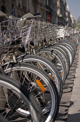 Fototapeta na wymiar Row of rental bikes in Paris, France