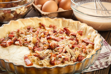 Making stuffing while preparing a traditional quiche