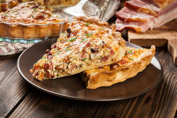 Pieces of quiche lorraine with bacon and cheese
