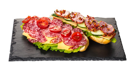 sandwich with salami, cheese and vegetables