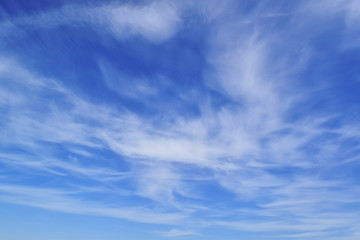 Naklejka na ściany i meble beautiful blue sky, airy white clouds, free space for text