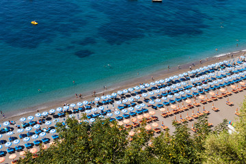 Positano Amalfi Coast Neaples Italy - Abstract view of beach with umbrella rows.