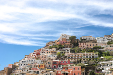 Fototapeta premium Positano Amalfi Coast Neaples Italy - Abstract view of colored houses and windy clouds.