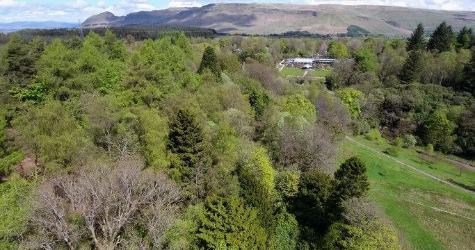 Aerial footage over Mugdock Country Park near Milngavie in Central Scotland.