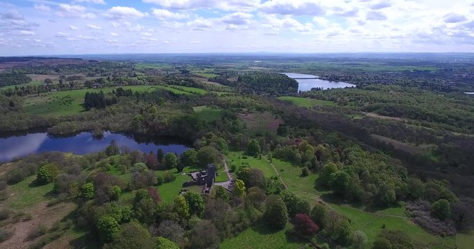 Aerial footage over Mugdock Country Park near Milngavie in Central Scotland.
