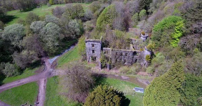 Aerial footage over Mugdock Country Park near Milngavie in Central Scotland.