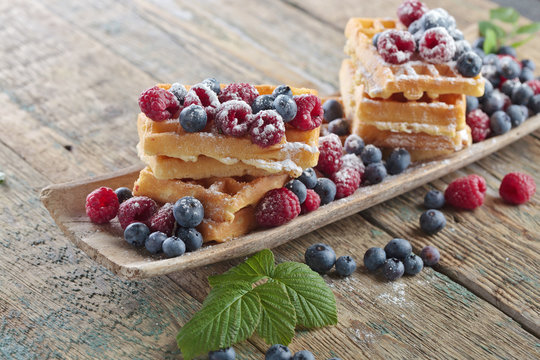 Waffles with raspberry and blueberry