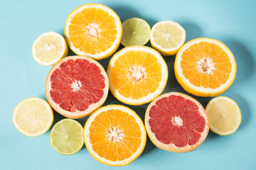 Fototapeta na wymiar Orange and lemon halves