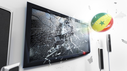 Soccer ball with the flag of Senegal kicked through a shattering tv screen.(3D rendering series)