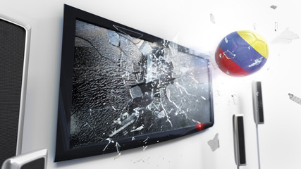 Soccer ball with the flag of Colombia kicked through a shattering tv screen.(3D rendering series)