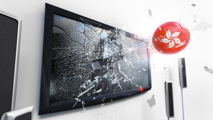 Soccer ball with the flag of Hong Kong kicked through a shattering tv screen.(3D rendering series)