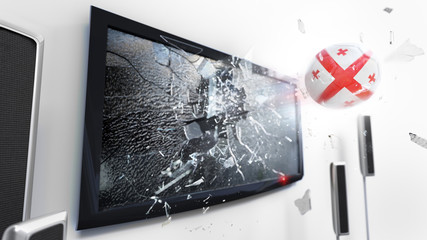 Soccer ball with the flag of Georgia kicked through a shattering tv screen.(3D rendering series)