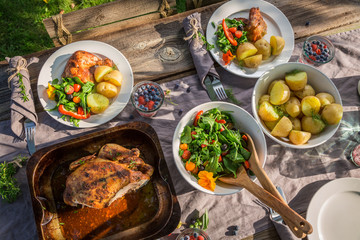 Top view of homemade dinner in summer garden