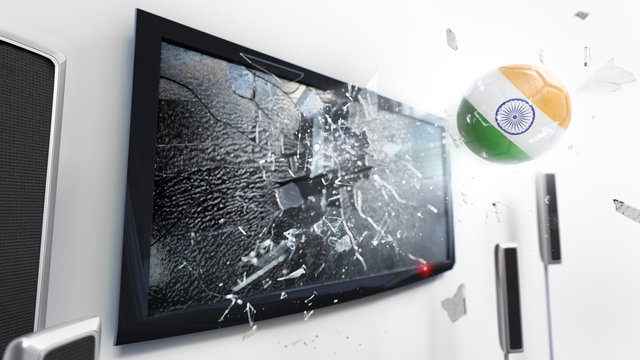 Soccer ball with the flag of India kicked through a shattering tv screen.(3D rendering series)