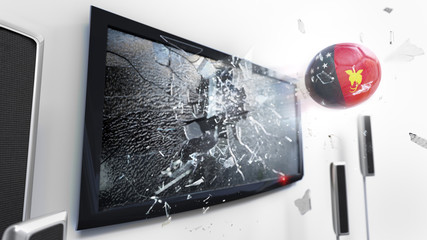 Soccer ball with the flag of Papua New Guinea kicked through a shattering tv screen.(3D rendering series)