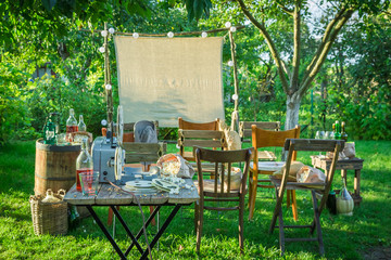 Cinema with old analog films in summer garden