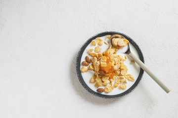 Eco healthy food background. Corn flakes with milk . Top view image