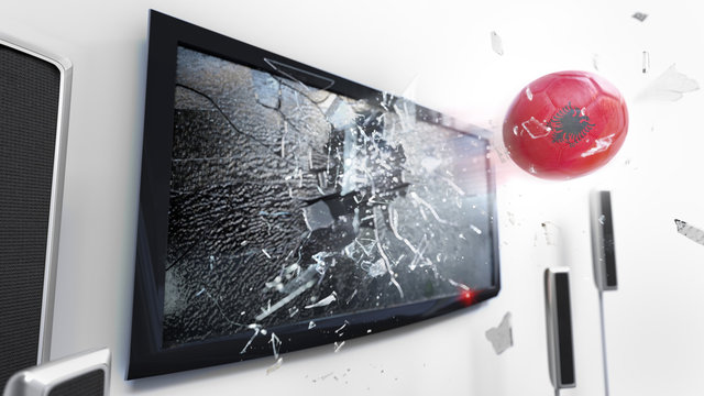 Soccer ball with the flag of Albania kicked through a shattering tv screen.(3D rendering series)