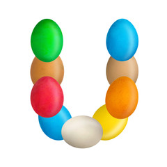 The letter U of the English alphabet is made up of colorful eggs. Isolated. White background. Education