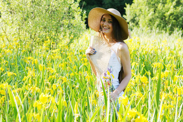 Girl in a forest glade on a sunny day