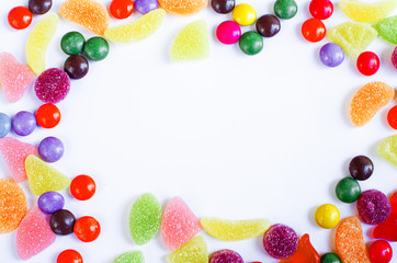 Scattered colored candy on a limited