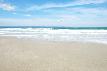 Fototapeta na wymiar Beach and sea in bright sunlight