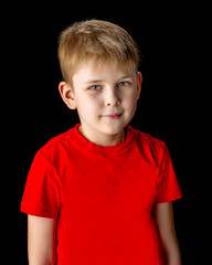 Little boy on a black background.
