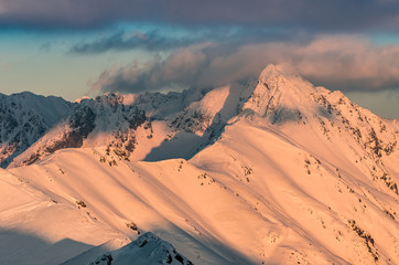 Fototapeta na wymiar Winter sunet in Tatra Mountains, alpine landscape of Poland and Slovakia