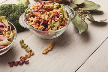 Various types of handmade pasta on white background