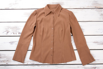 Female brown color formal shirt. Women long sleeve slim business work blouse shirt, white wooden...
