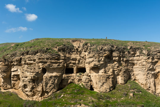 Ancient caves near the mausoleum of Diri Baba, places for pilgrims  14th century, Gobustan city, Azerbaijan