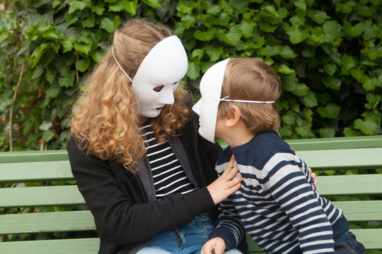 Girl and boy with a white mask. Arguing