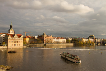 early fall, autumn in Praque, boat on Vltava river, Czech, editorial use  