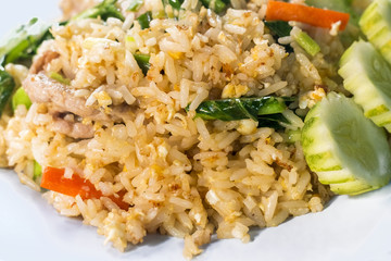 Thai food style , fried rice with pork on white background.Closed up