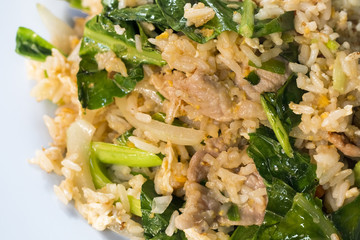 Thai food style , fried rice with pork on white background.Closed up