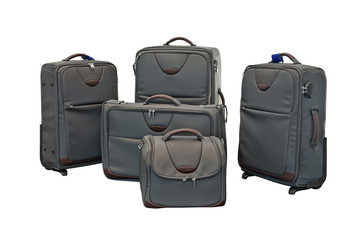 Travel luggage set with airplane in background