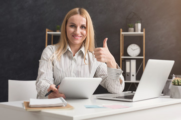Young business woman portrait at office