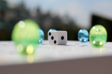 dice on Board game blurred background