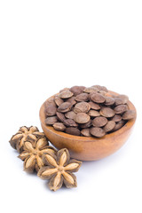 Plukenetia volubilis or sacha inchi peanut seed in wooden bowl isolated on white background