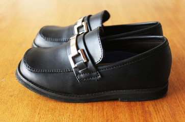Fototapeta na wymiar child's leather shoes