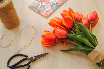 Bouquet of tulips and scissors