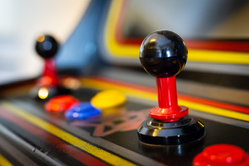 Joystick of a vintage arcade videogame - Coin-Op - obrazy, fototapety, plakaty