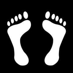 feet symbol on a black background