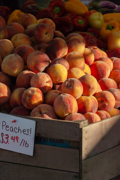 Peaches for sale in crate