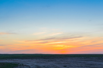 Fototapeta na wymiar Amazing sunsets in steppes of Kalmykia
